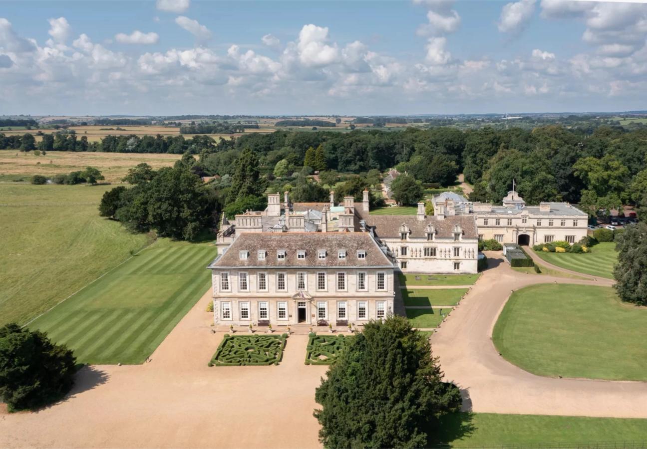 Stapleford Park Hall and sweeping drive seen from above