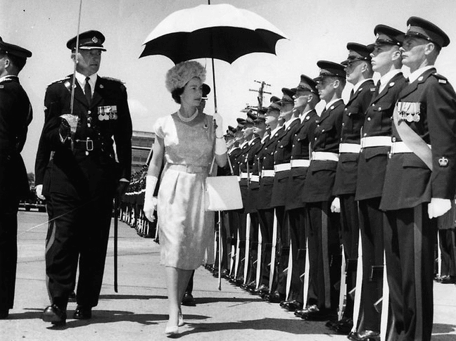 1963 - Queen Elizabeth inspects troops shortly after arriving ashore at Newstead Wharf, Brisbane, Australia (Getty Images)
