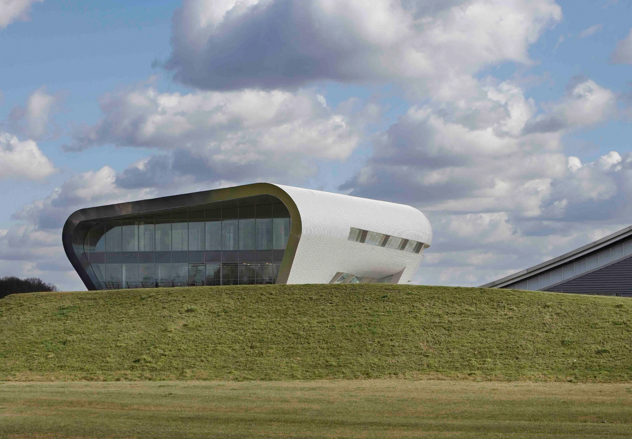 Exterior smooth curvy architecture of Farnborough Airport