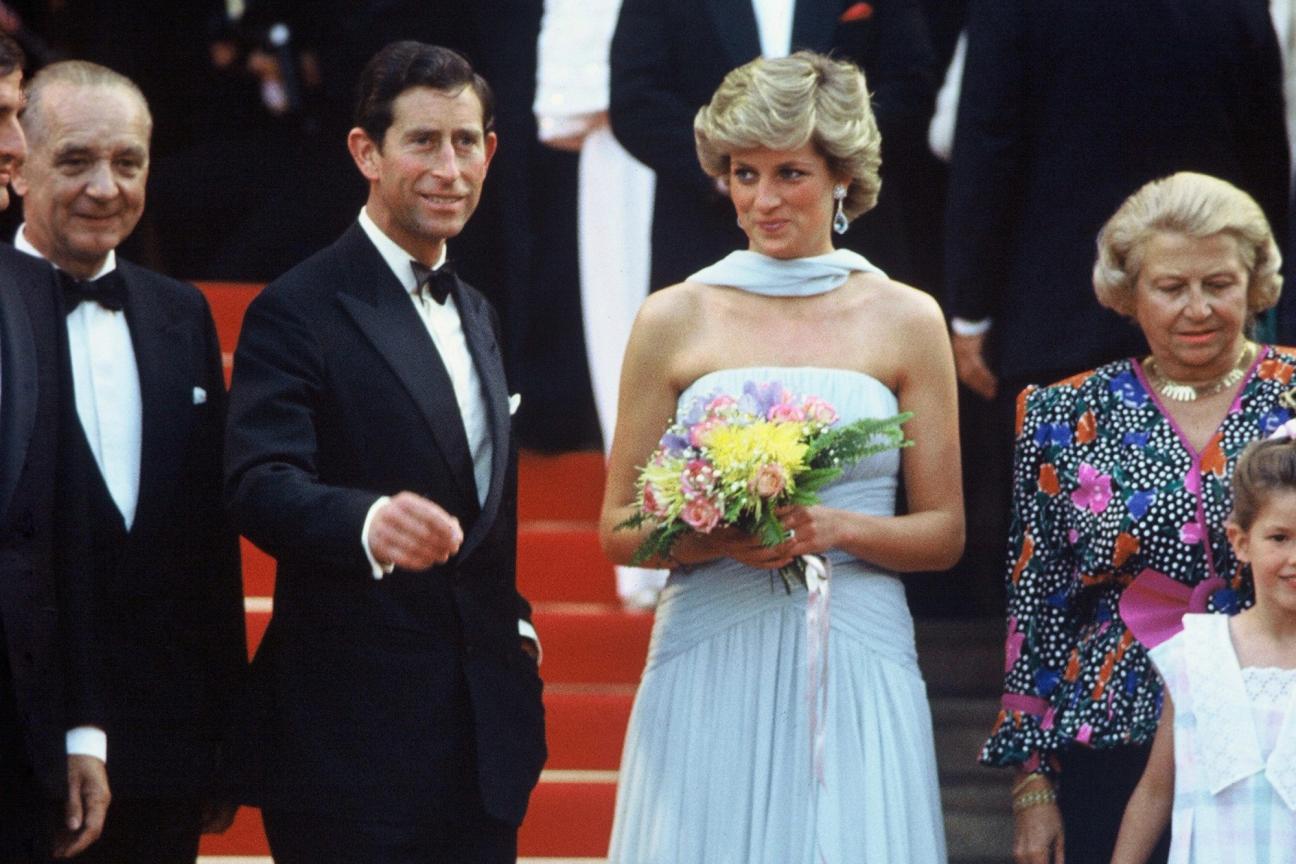 CANNES - MAY 15: Princess Diana, Princess of Wales, wearing a pale blue chiffon dress and matching stole by Catherine Walker, and Prince Charles, Prince of Wales attend Cannes film festival on May 15, 1987 in Cannes, France (Photo by Anwar Hussein/Getty Images)