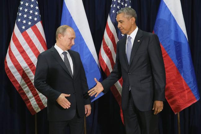 NEW YORK, NY - SEPTEMBER 28: (AFP OUT) Russian President Vladimir Putin (L) and U.S. President Barack Obama shake hands for the cameras before the start of a bilateral meeting at the United Nations headquarters September 28, 2015 in New York City. Putin and Obama are in New York City to attend the 70th anniversary general assembly meetings. (Photo by Chip Somodevilla/Getty Images)