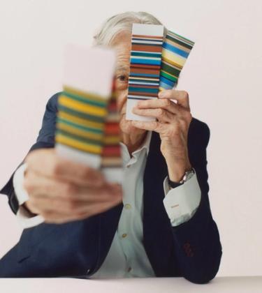 Paul Smith holding striped colour samples