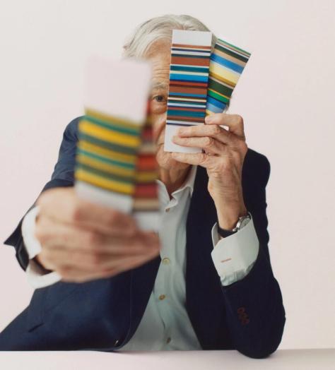 Paul Smith holding striped colour samples
