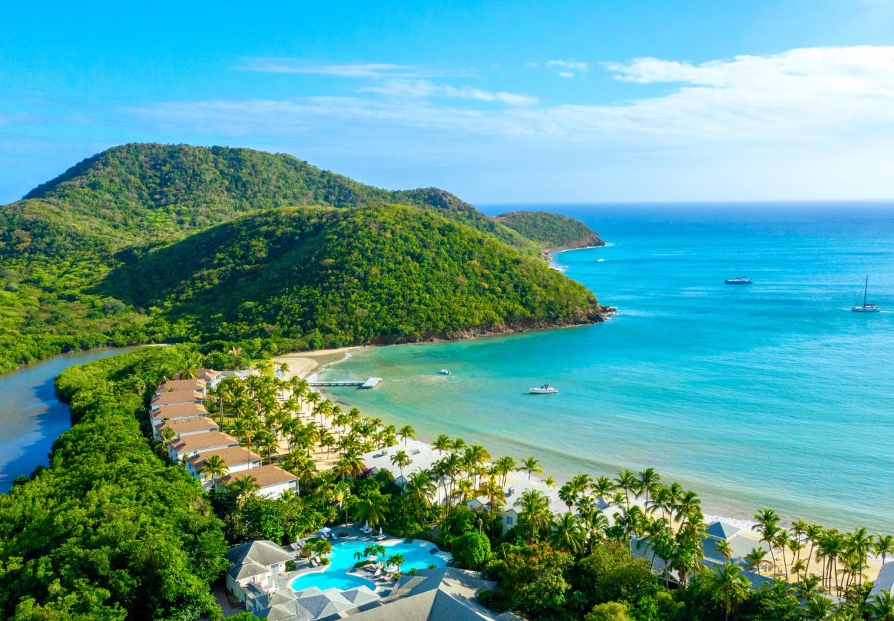 Aerial view of Carlisle Bay Antigua and its horseshoe-shaped beach