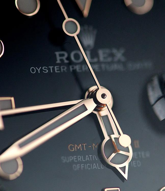 Close up of Rolex watch hands