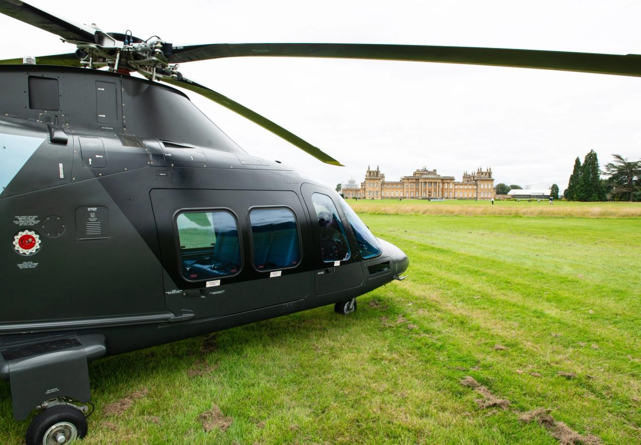 Black helicopter on the lawn in front of Blenheim Palace