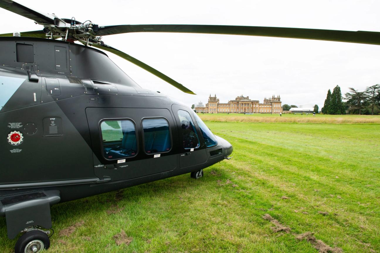 Black helicopter on the lawn in front of Blenheim Palace