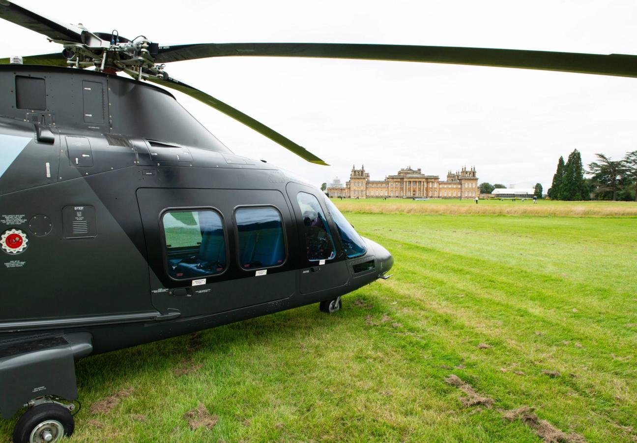 Black helicopter on the lawn in front of Blenheim Palace