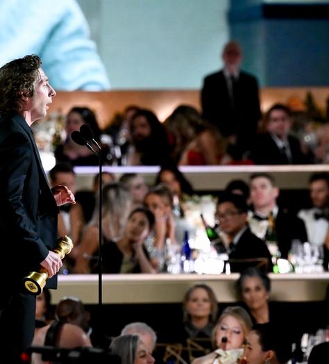 Jeremy Allen White accepting Golden Globe for Best Actor in a Musical or Comedy TV Series