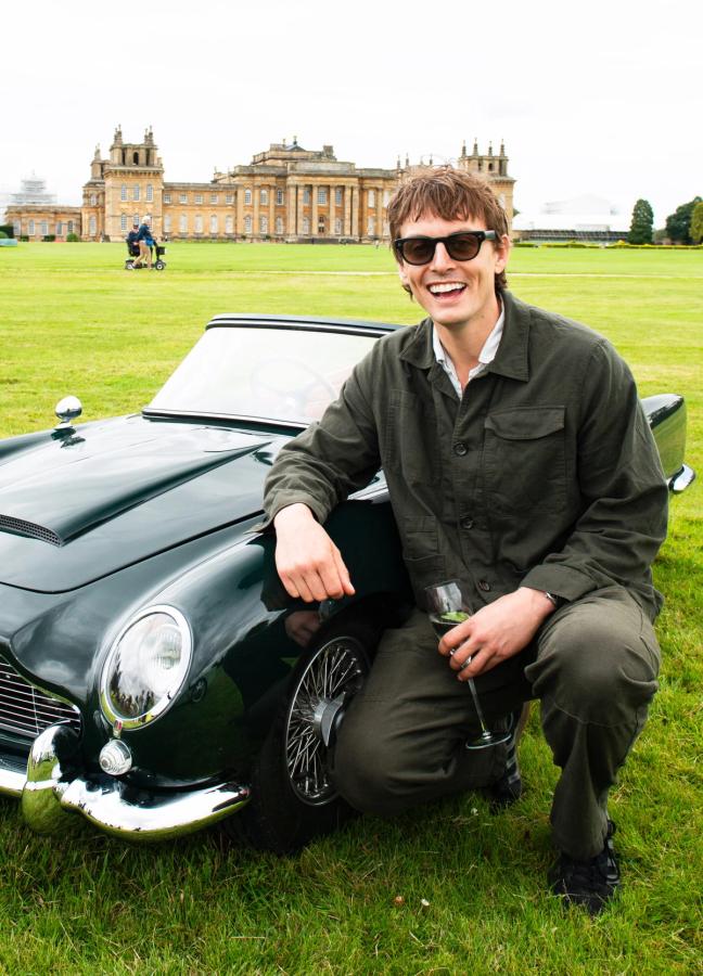 Thomas Straker with a small classic car