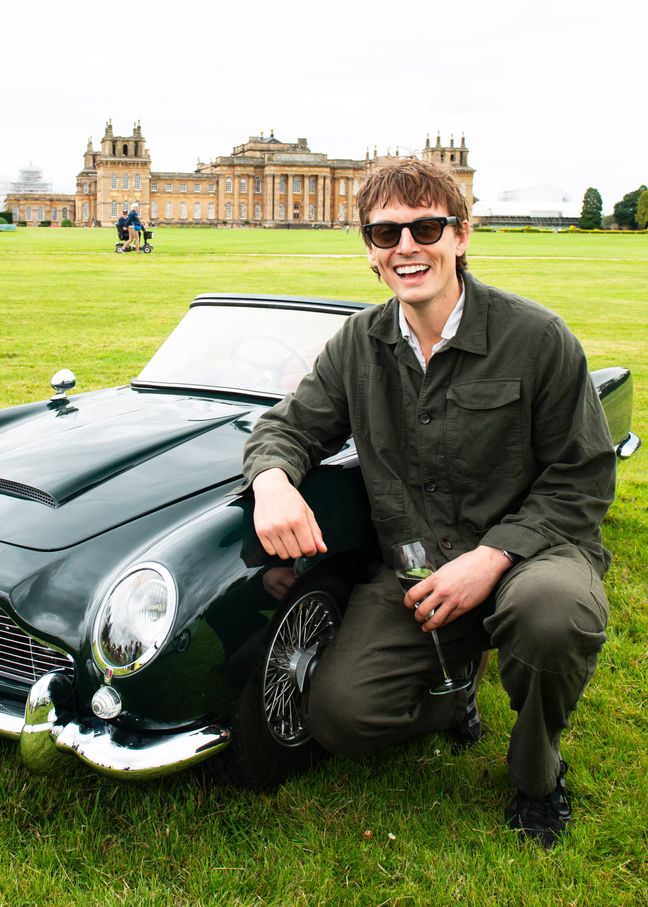 Thomas Straker with a small classic car