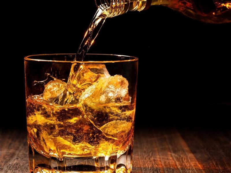 Bourbon with one big ice cube - only way to go.