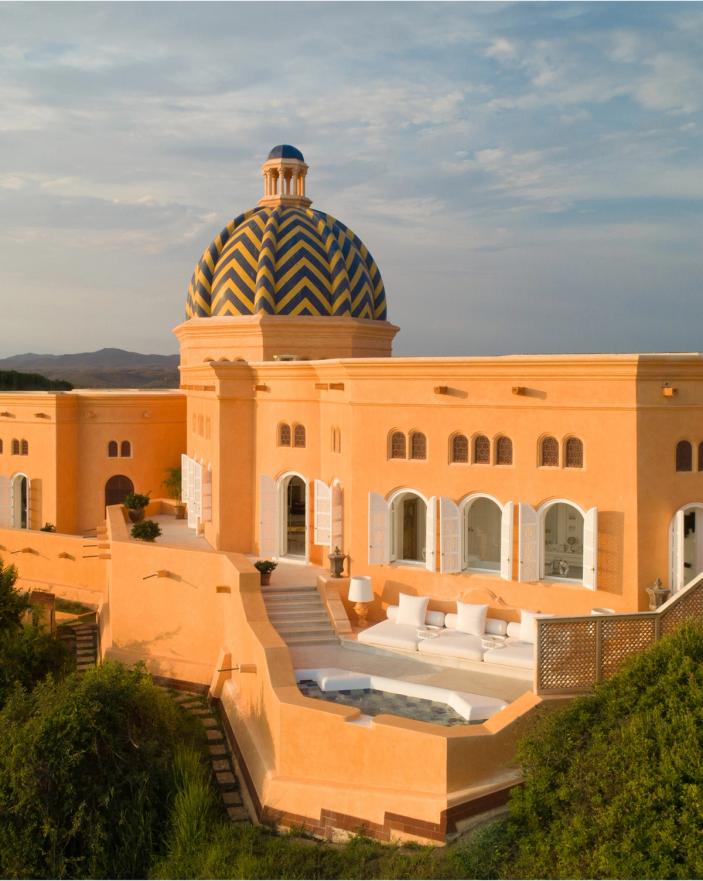 Terracotta architecture and domed tower at Cuixmala