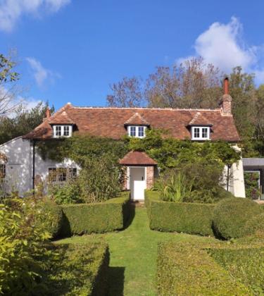 This idyllic country cottage hides a stunning modern home