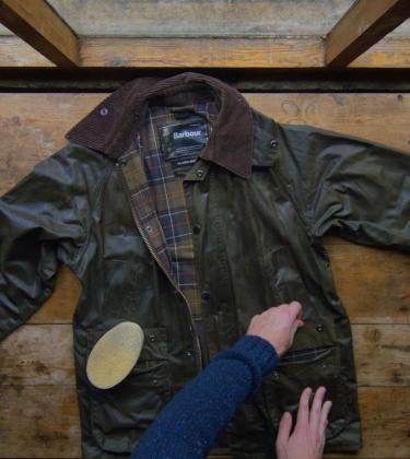 A Barbour waxed canvas jacket is rewaxed