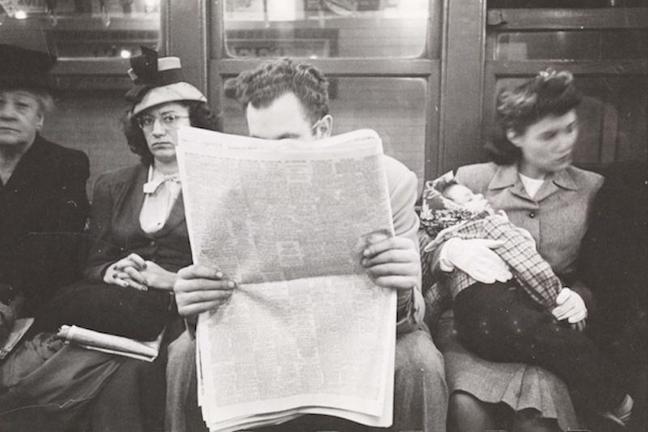 man-reading-newspaper