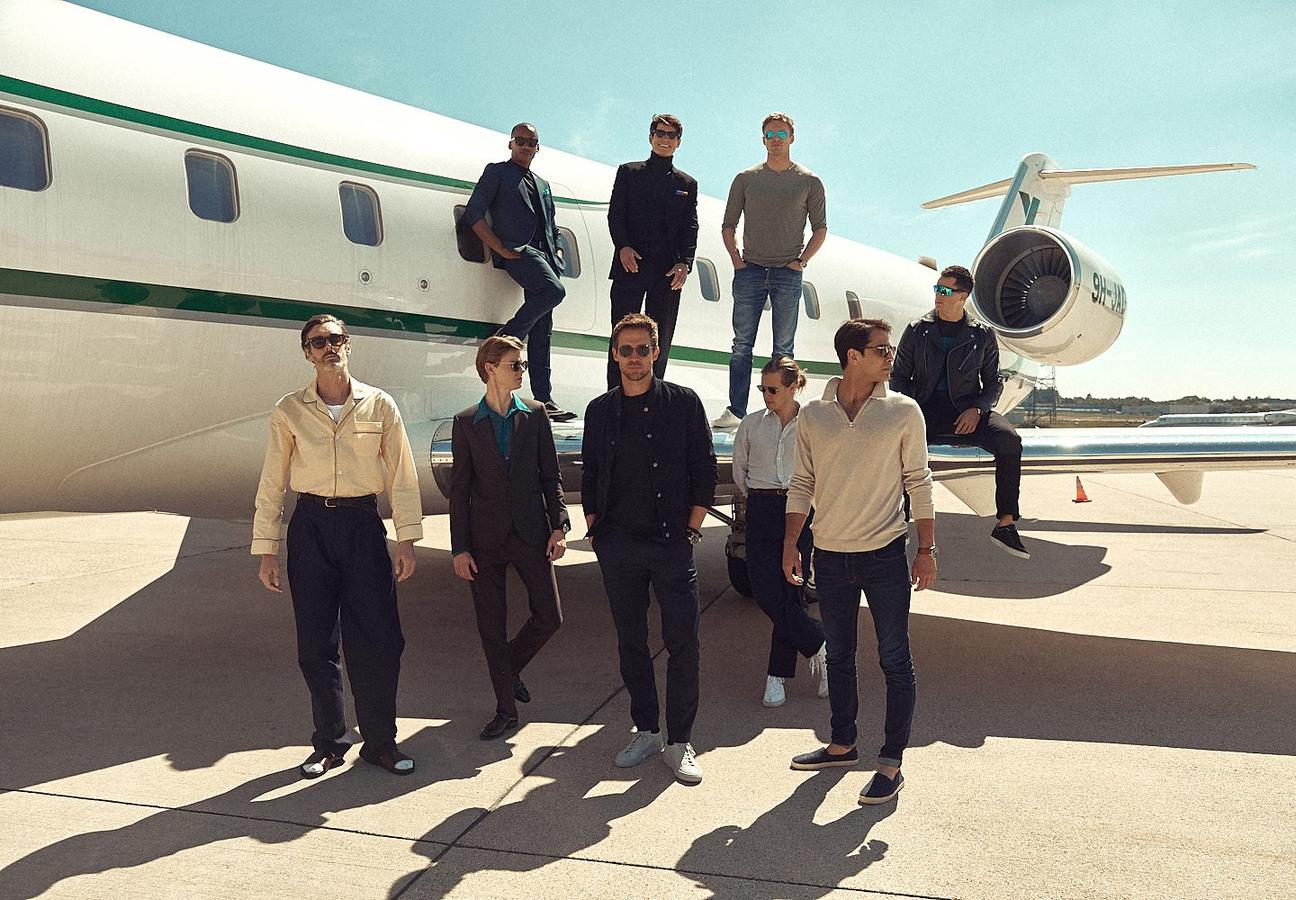 men with private plane