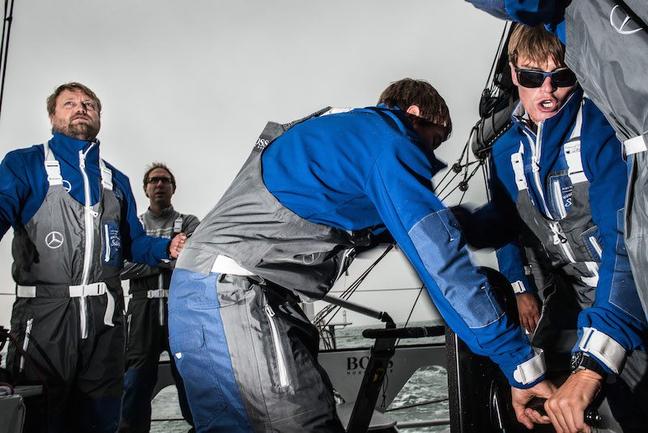 Image licensed to Lloyd Images - Free for editorial use The 2015 Artemis Challenge as part of Aberdeen Asset Management Cowes Week 2015. Cowes. Isle of Wight. Pictures of skipper Alex Thomson (left) and Oliver Cheshire (far right) on board HUGO BOSS - IMOCA 60 at the start of the 2015 Artemis Challenge Credit: Lloyd Images
