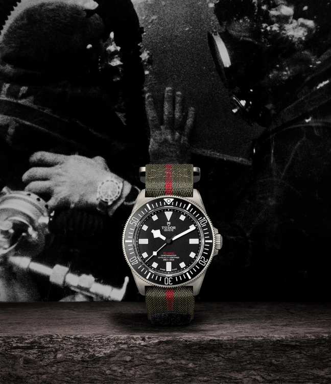 Tudor Pelagos FXD watch in front of a black and white image of divers