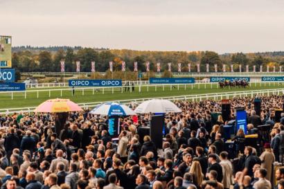 Crowds watching racing at Ascot on British Champions Day