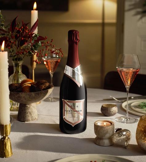Bottle of 1086 Rosé by Nyetimber on a table
