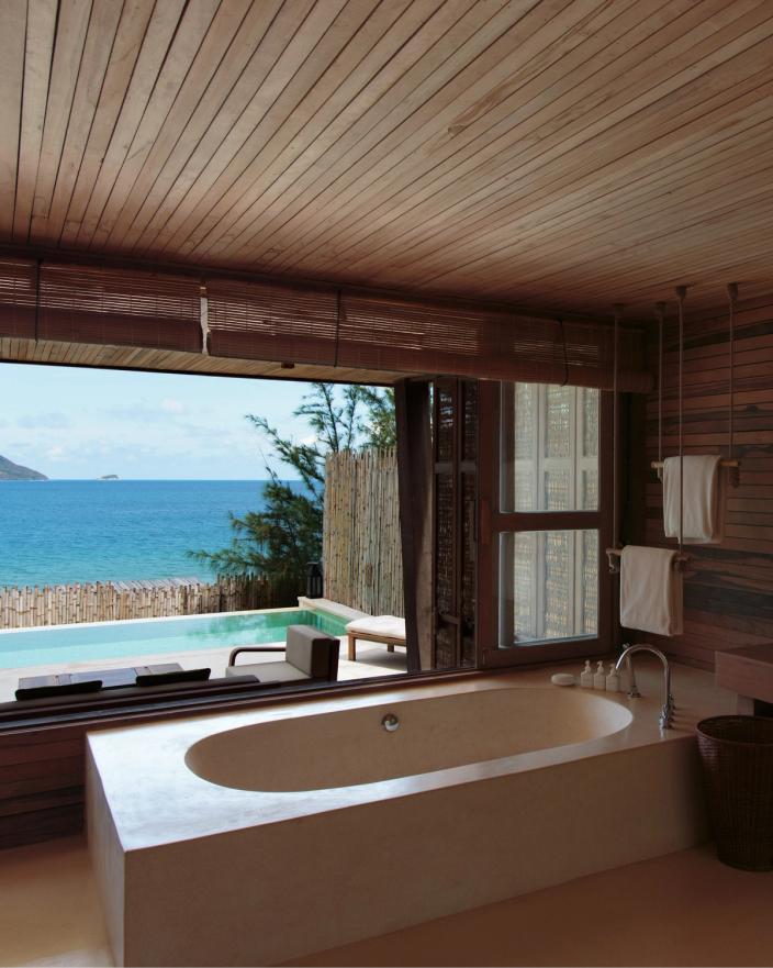 Bath with a sea view at Six Senses Con Dao