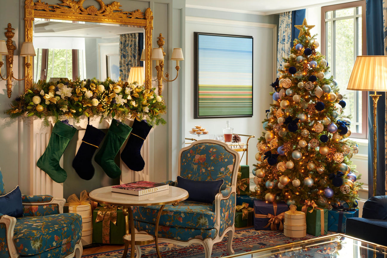 Living room decorated with Christmas stockings and tree at the Dorchester