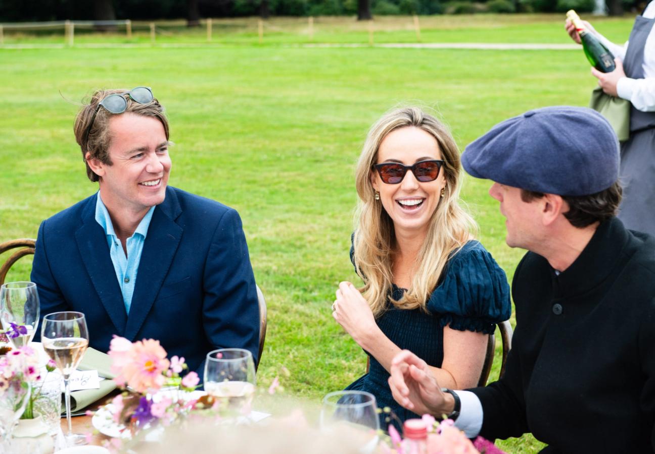 George Blandford, Jemima Cadbury and Alexander Spencer-Churchill chatting at the dinning table