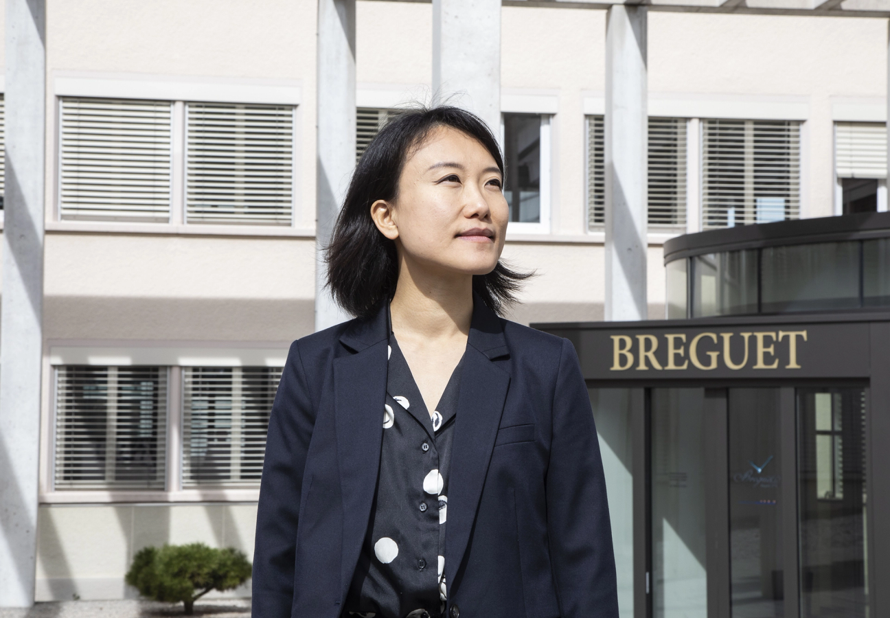 Curator Somi Sim outside a Breguet building