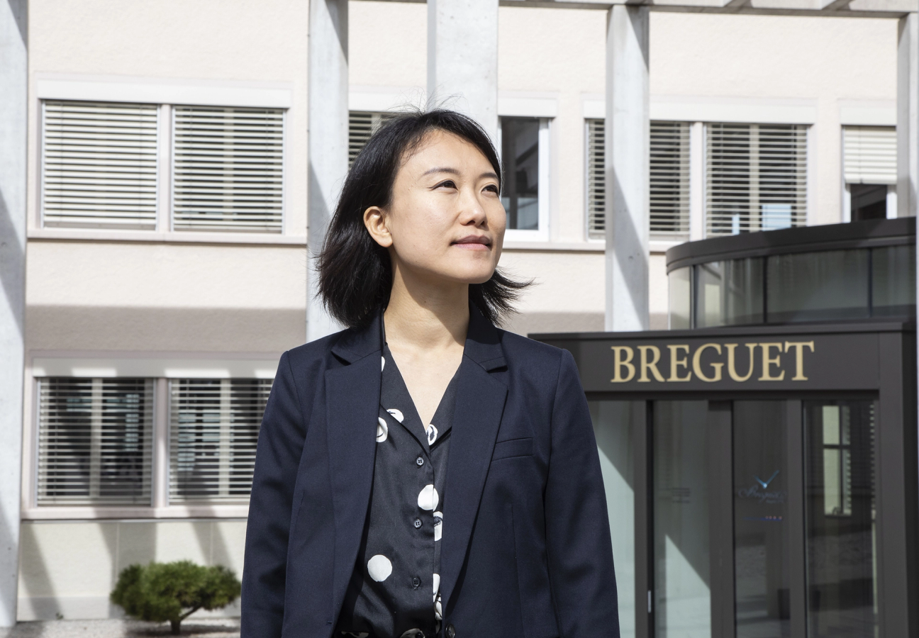 Curator Somi Sim outside a Breguet building