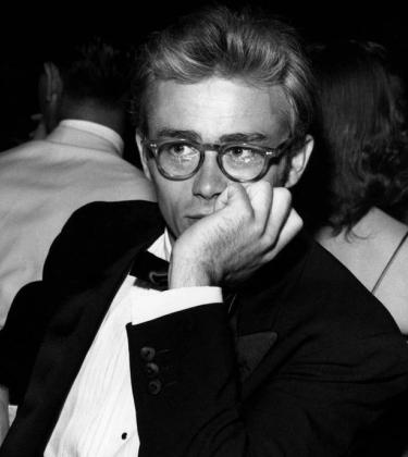 James Dean wearing glasses in a tux
