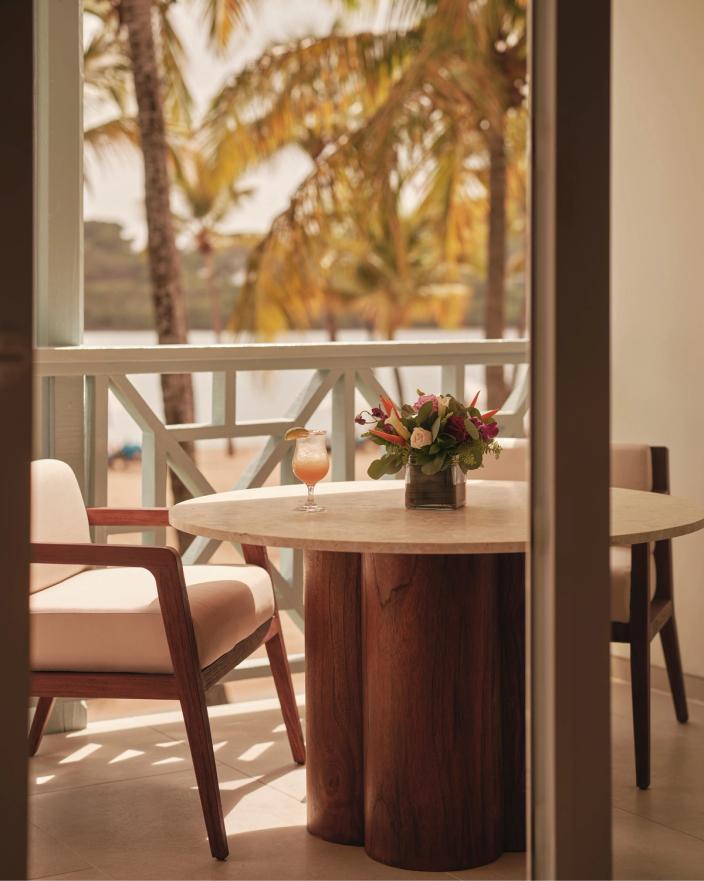 Dining area overlooking the garden at Carlisle Bay Antigua