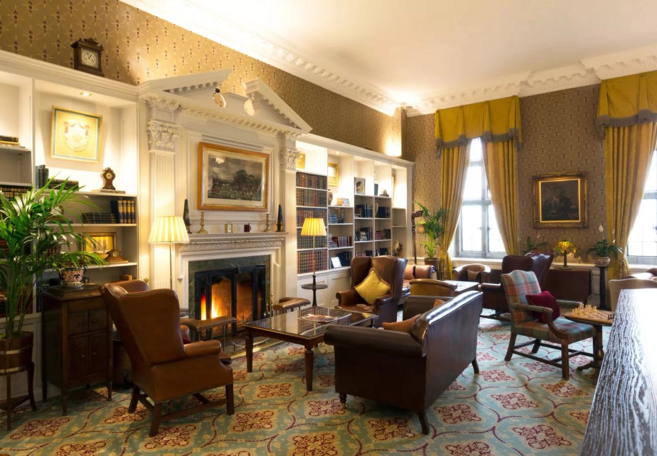 Elegant reception room with fireplace at Stapleford Park