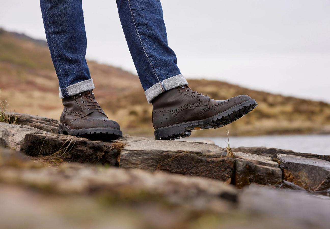 Man wearing Crockett & Jones Islay shoes in Dark Brown Rough-Out Suede around the Trossachs