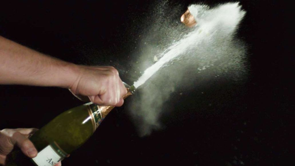 The coolest way to open a bottle of Champagne