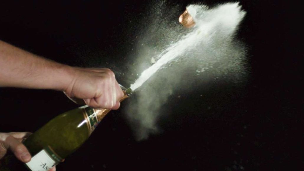 The coolest way to open a bottle of Champagne