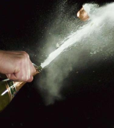 The coolest way to open a bottle of Champagne
