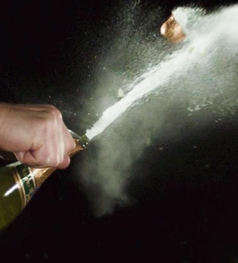 The coolest way to open a bottle of Champagne