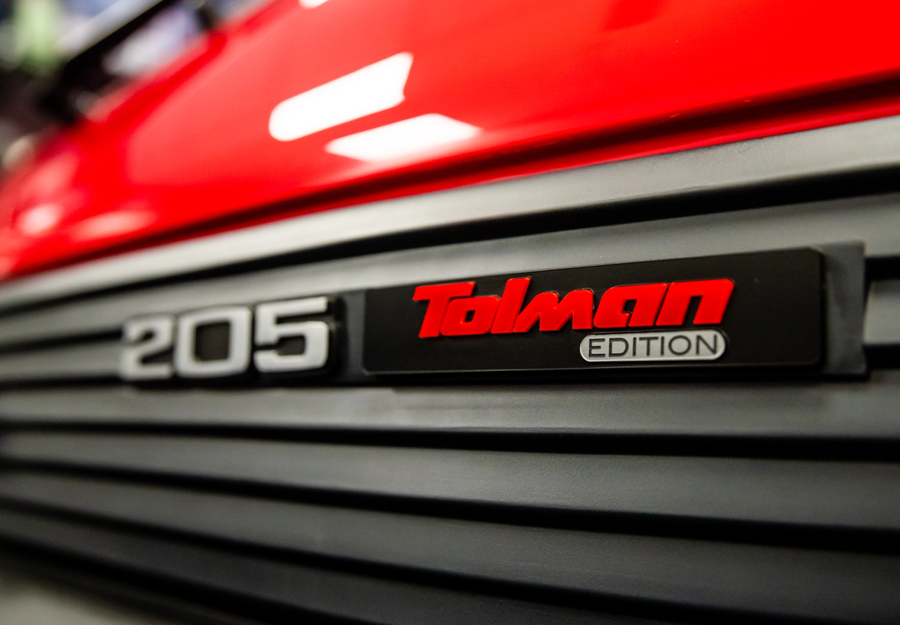 Close up of Red Peugeot 205 GTi Tolman Edition rear logos