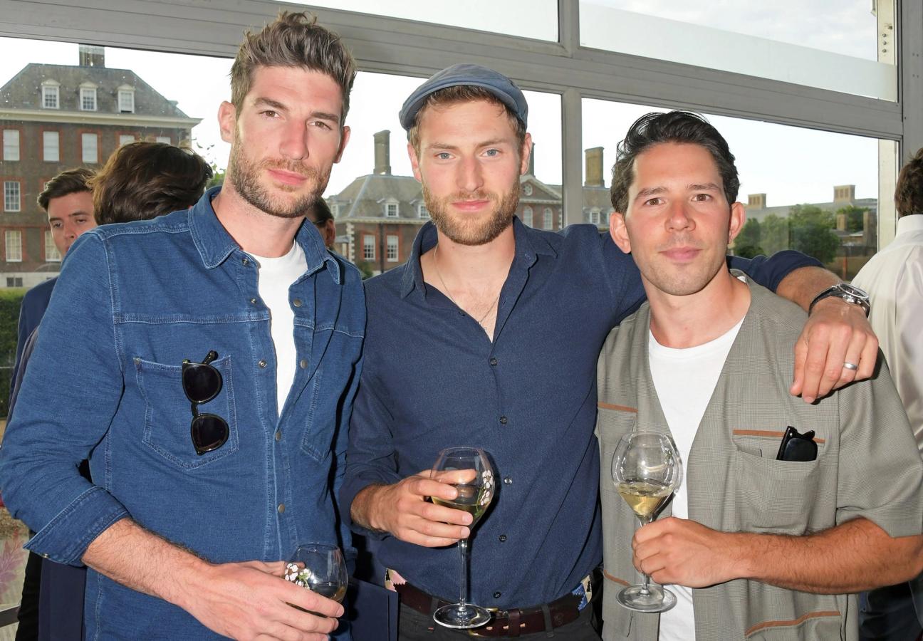 Ryan-Barrett-guest-and-Adam-Fussell-at-The-Gentlemans-Journal-Summer-Party-at-Masterpiece-London