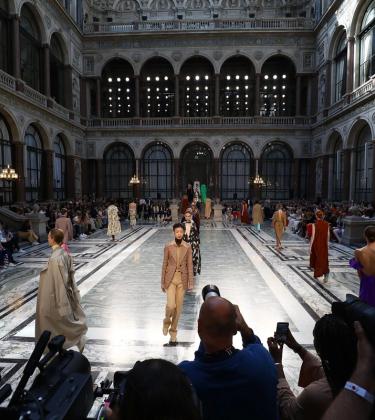 cat walk filled iwht femail models wearing a variety.