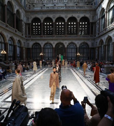 cat walk filled iwht femail models wearing a variety.