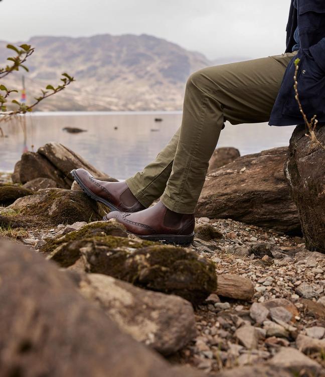 Man wearing Crockett & Jones Harris shoes in Coffee Hurricane Hide around the Trossachs