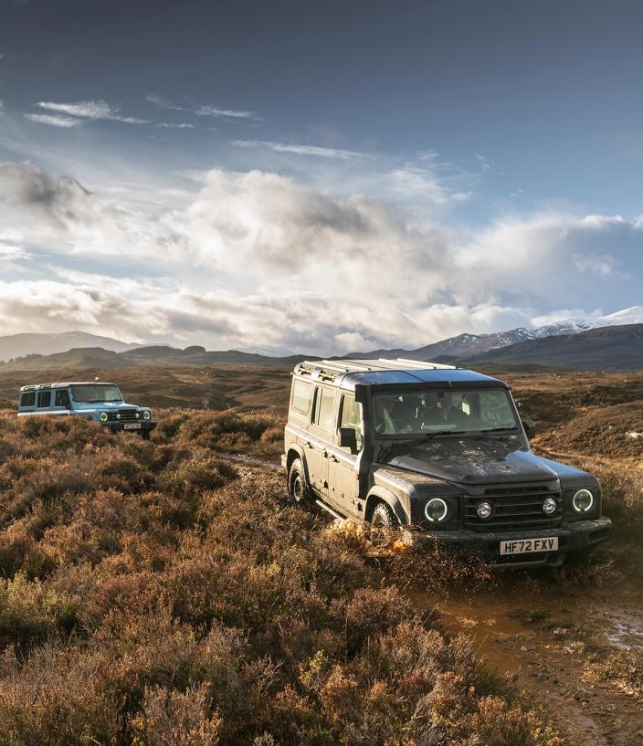 Ineos Grenadiers driving over wild bush terrain 