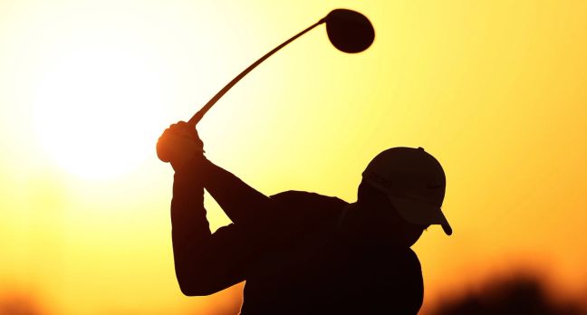 silhouette of golfer