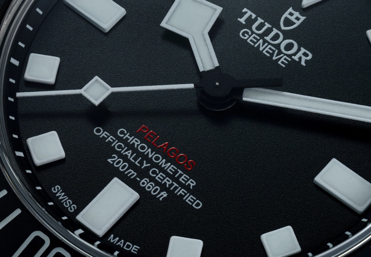 A close up of a Tudor Pelagos FXD watch face