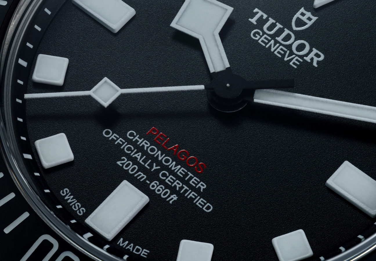 A close up of a Tudor Pelagos FXD watch face