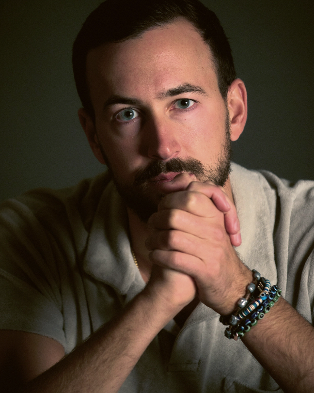 Supersnake, Andreas Metaxa, with his hands together