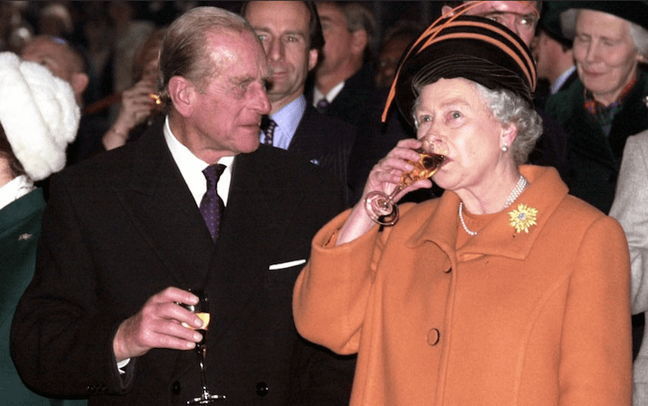 2000 - Philip and the Queen toast the millenium at the Millenium Dome, London. (Arthur Edwards)