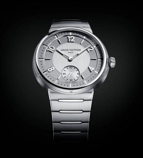 Watch face of the Louis Vuitton Tambour Automatic 40mm Steel watch on a black back drop